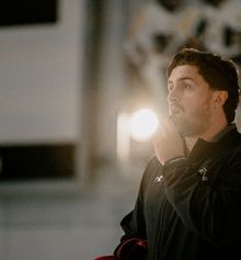 Hockey coach preparing to blow the whistle