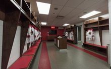 One of the Hockey Etcetera dressing rooms lined with NHL style stalls which have Hockey Etcetera jerseys hanging from them